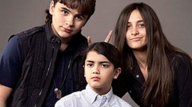 Michael Jackson’s kids peep out from their (security) blankets
