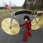 German bicycle designer Senft poses with self-made bike honouring ate US singer Michael Jackson in  village of Philadelphia near Storkow