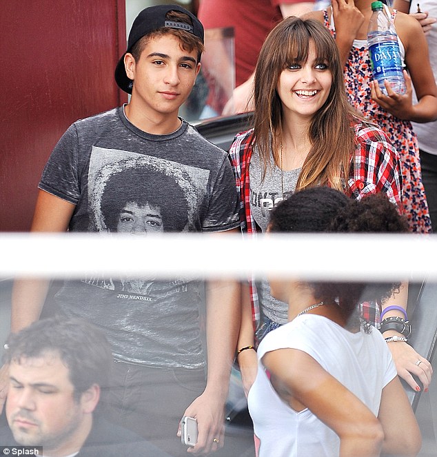 Fledgling romance? Paris Jackson was joined by a handsome young man in LA on Sunday 