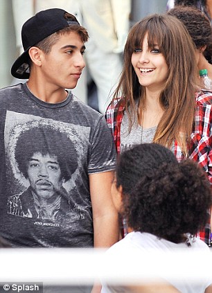 Is this the look of love? The pair exchanged glances as they strolled around a mall in Century City 
